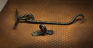 Forged hook and eye latch